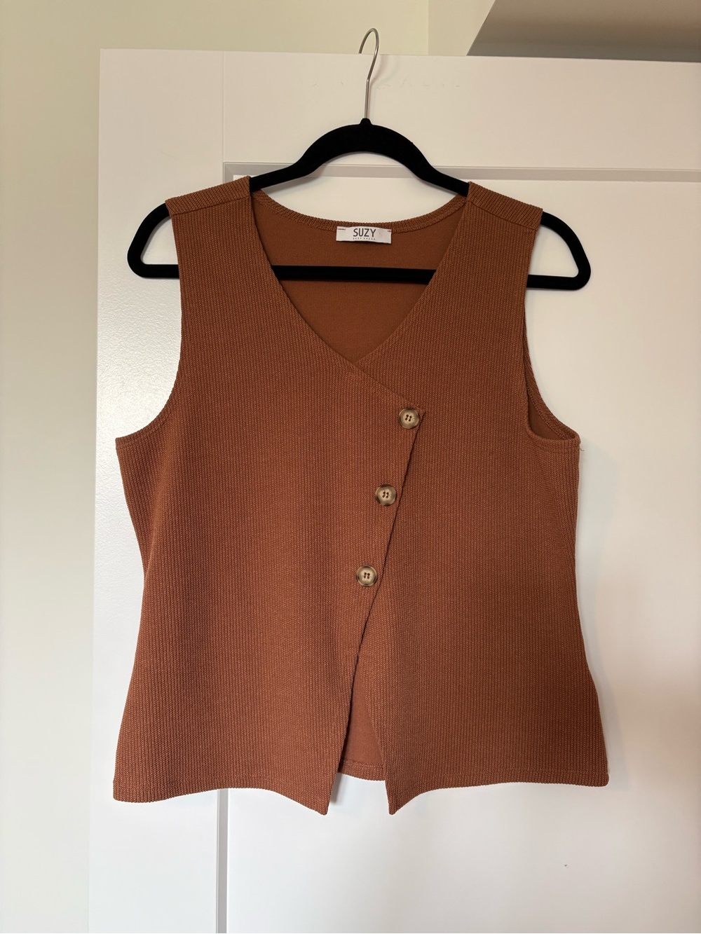Sleeveless V-Neck Button Front Tank Top.